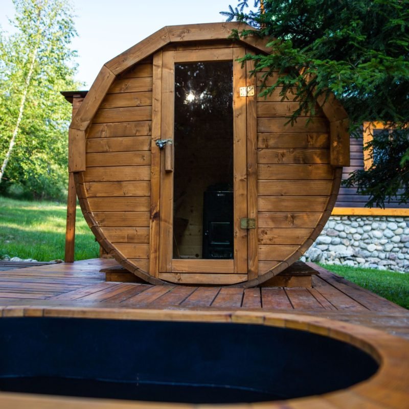 closeup-shot-of-a-wooden-barrel-sauna-in-the-fores-2026-01-07-07-19-30-utc